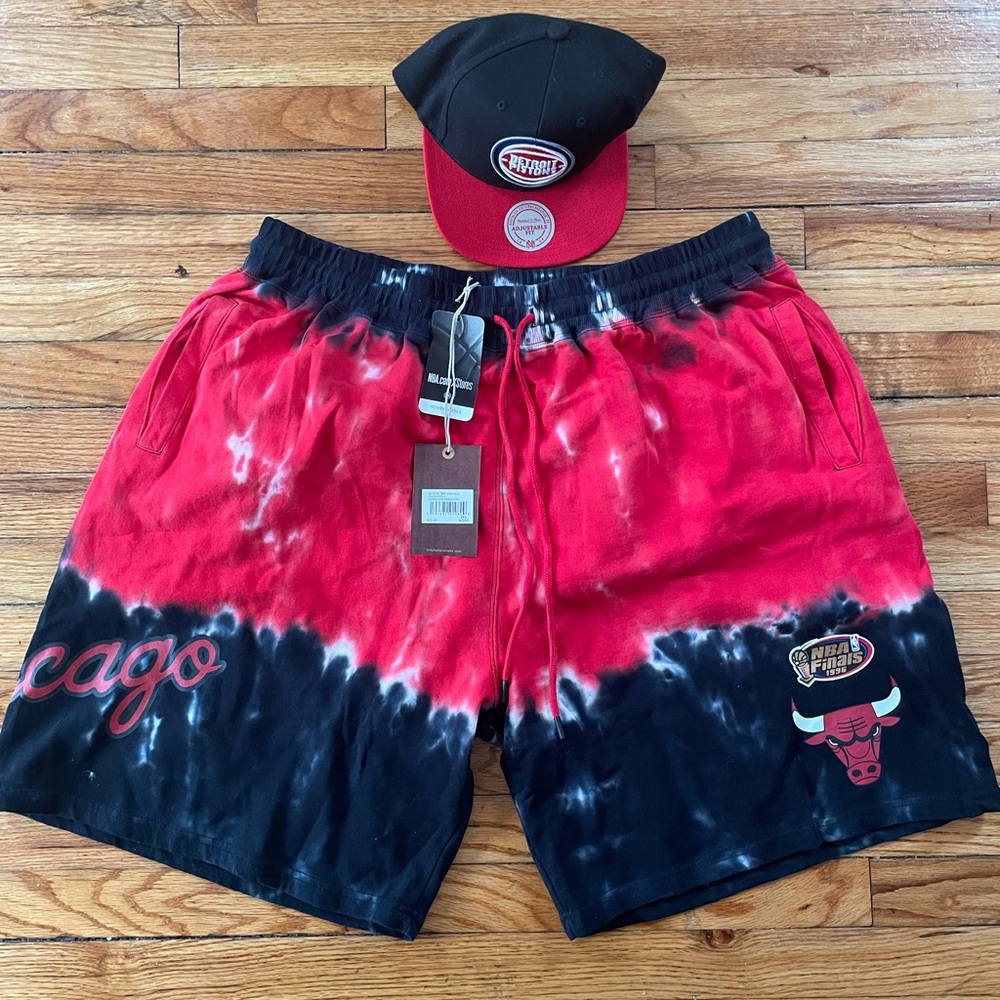 Chicago bulls shorts size 2x with a Detroit pistons snap back, brand new!